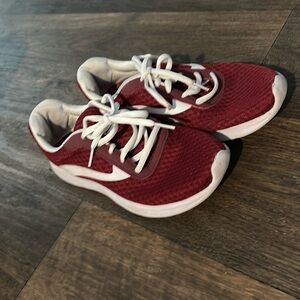 Maroon and white shoes